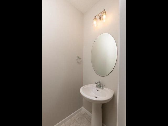 3212 Kady Ave NE, Saint Michael, MN 55376 - bathroom featuring tile patterned floors and baseboards