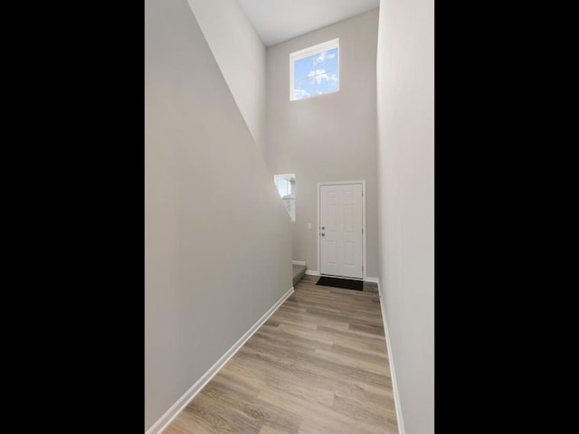 3212 Kady Ave NE, Saint Michael, MN 55376 - hall featuring baseboards and light wood finished floors