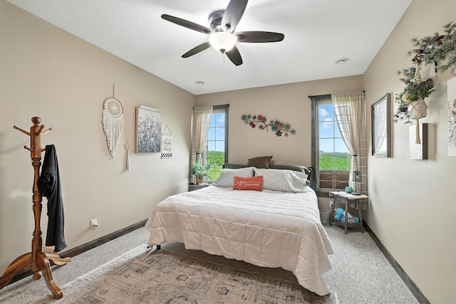 129 Highland Cir, Dassel, MN 55325 - carpeted bedroom with multiple windows and ceiling fan