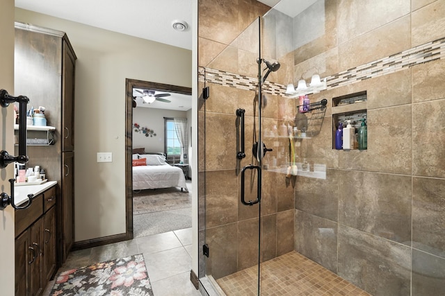 129 Highland Cir, Dassel, MN 55325 - bathroom with a stall shower, ensuite bath, vanity, tile patterned flooring, and a ceiling fan