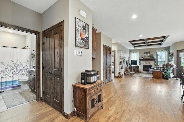 129 Highland Cir, Dassel, MN 55325 - hallway with light wood-style flooring, recessed lighting, coffered ceiling, and beam ceiling