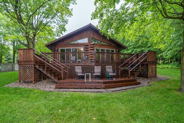 2913 125th St, Island Lake Twp, MN 56651 - back of property with stairway, a deck, and log exterior