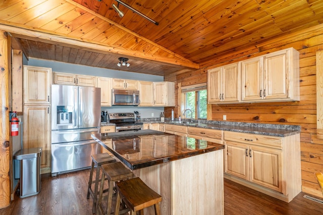 2913 125th St, Island Lake Twp, MN 56651 - kitchen with stainless steel appliances, light brown cabinetry, wooden ceiling, dark wood-style floors, and a kitchen breakfast bar