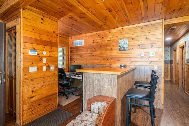 2913 125th St, Island Lake Twp, MN 56651 - bar featuring wood walls, dark wood-type flooring, and wood ceiling