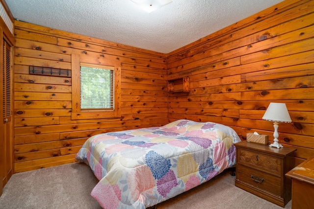2913 125th St, Island Lake Twp, MN 56651 - carpeted bedroom with a textured ceiling and wood walls
