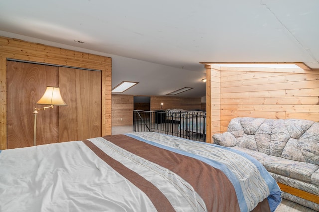 2913 125th St, Island Lake Twp, MN 56651 - bedroom with wooden walls and lofted ceiling