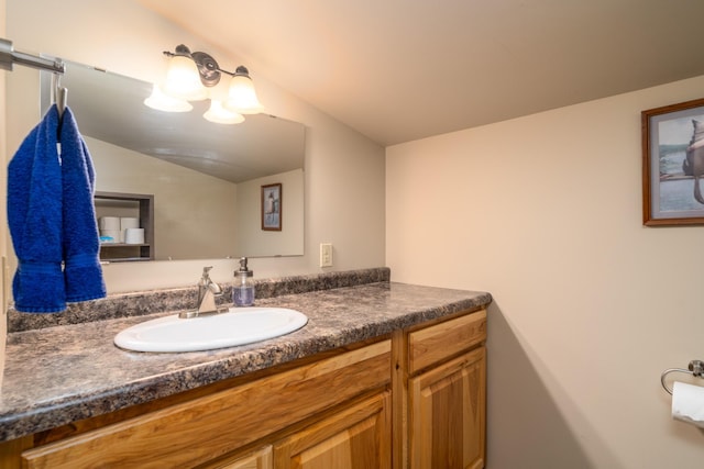 2913 125th St, Island Lake Twp, MN 56651 - bathroom with vanity and vaulted ceiling