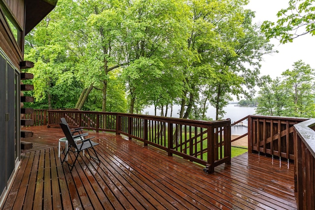 2913 125th St, Island Lake Twp, MN 56651 - wooden terrace featuring a water view
