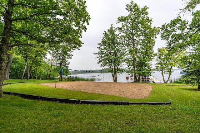 2913 125th St, Island Lake Twp, MN 56651 - surrounding community with a water view, volleyball court, and a lawn