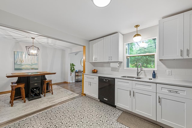 211 Viola St, Mankato, MN 56001 - kitchen featuring dishwasher, light countertops, and tasteful backsplash