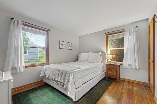 211 Viola St, Mankato, MN 56001 - bedroom with light wood-style floors and baseboards