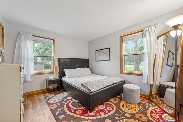 211 Viola St, Mankato, MN 56001 - bedroom featuring hardwood / wood-style flooring and vaulted ceiling
