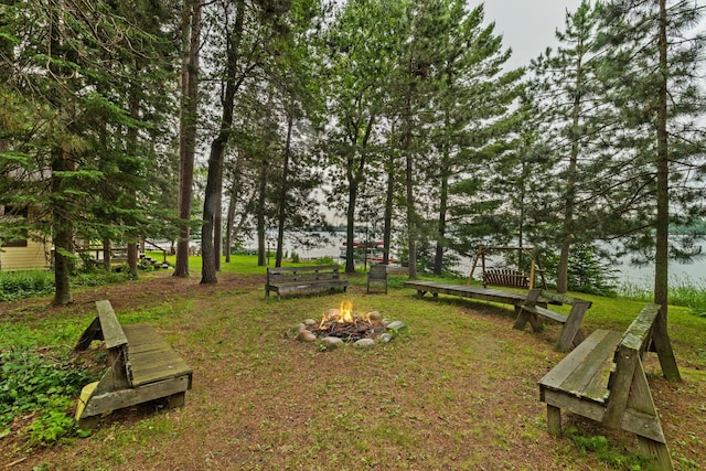 14354 Chippewa Loop, Park Rapids, MN 56470 - view of home's community featuring a fire pit and a water view