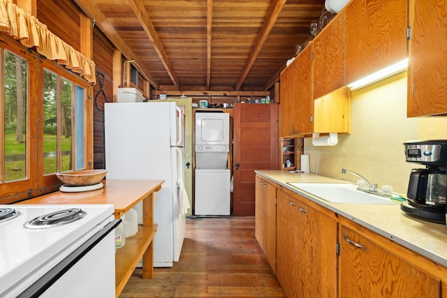 14354 Chippewa Loop, Park Rapids, MN 56470 - kitchen with stacked washer / drying machine, white appliances, wood ceiling, dark wood-style flooring, and light countertops
