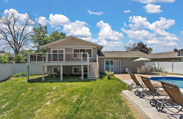 8473 Kentucky Ct N, Brooklyn Park, MN 55445 - rear view of house with stairs, a deck, a fenced backyard, and a patio
