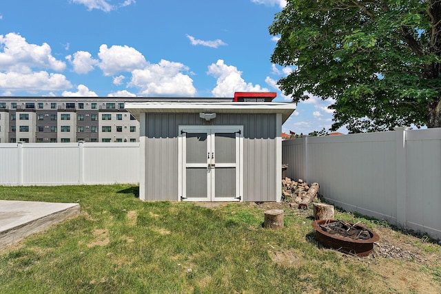 8473 Kentucky Ct N, Brooklyn Park, MN 55445 - view of shed featuring a fenced backyard