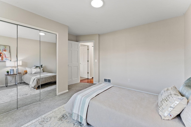 8473 Kentucky Ct N, Brooklyn Park, MN 55445 - carpeted bedroom featuring a closet and baseboards