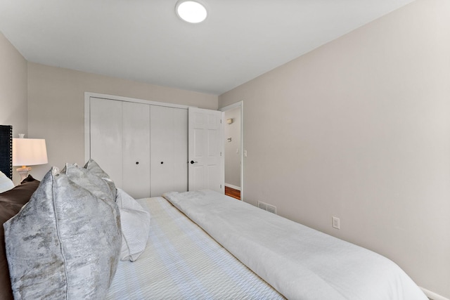 8473 Kentucky Ct N, Brooklyn Park, MN 55445 - bedroom featuring a closet and baseboards