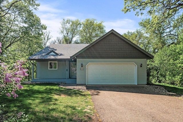 13838 Glendale Trl, Savage, MN 55378 - view of front facade with asphalt driveway, a garage, a front yard, and a porch