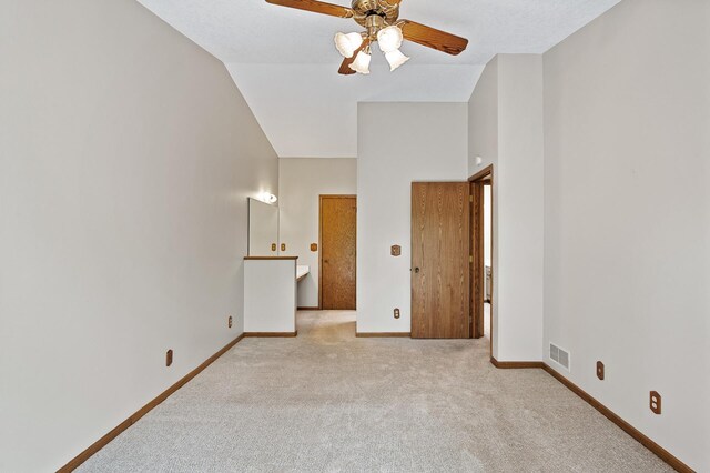 13838 Glendale Trl, Savage, MN 55378 - carpeted empty room with a ceiling fan and high vaulted ceiling