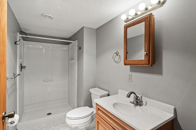 13838 Glendale Trl, Savage, MN 55378 - full bath with a stall shower, vanity, and a textured ceiling