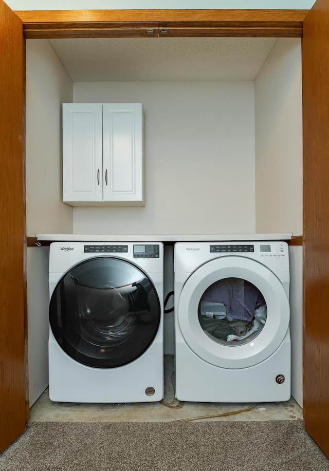 3714 8th St NW, Rochester, MN 55901 - washroom featuring washing machine and clothes dryer and cabinet space