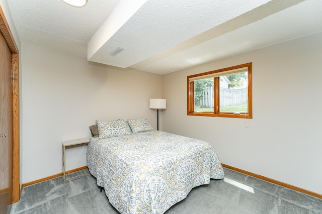 3714 8th St NW, Rochester, MN 55901 - bedroom featuring carpet floors and a textured ceiling