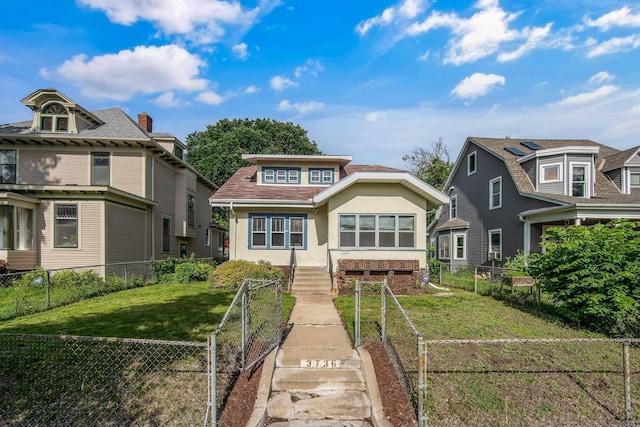 3736 Park Ave, Minneapolis, MN 55407 - view of front of home featuring stucco siding and a fenced backyard