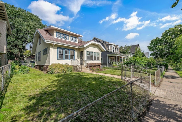 3736 Park Ave, Minneapolis, MN 55407 - view of front of house with stucco siding and a fenced backyard