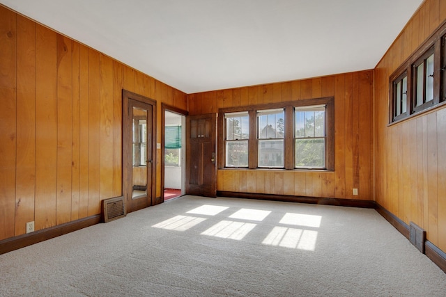 3736 Park Ave, Minneapolis, MN 55407 - carpeted spare room with wood walls
