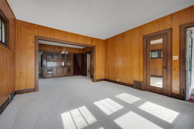3736 Park Ave, Minneapolis, MN 55407 - carpeted spare room with wood walls