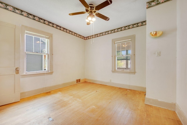 3736 Park Ave, Minneapolis, MN 55407 - empty room featuring light wood-type flooring and ceiling fan