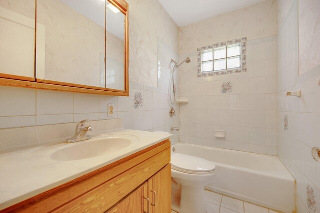 3736 Park Ave, Minneapolis, MN 55407 - bathroom featuring bathing tub / shower combination, tile walls, vanity, and tile patterned floors