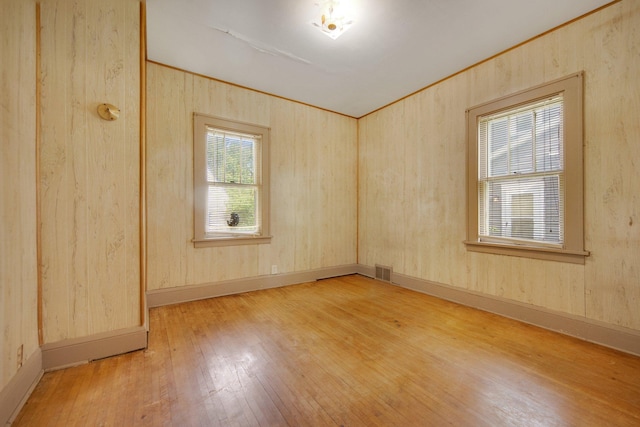 3736 Park Ave, Minneapolis, MN 55407 - spare room featuring hardwood / wood-style floors and baseboards