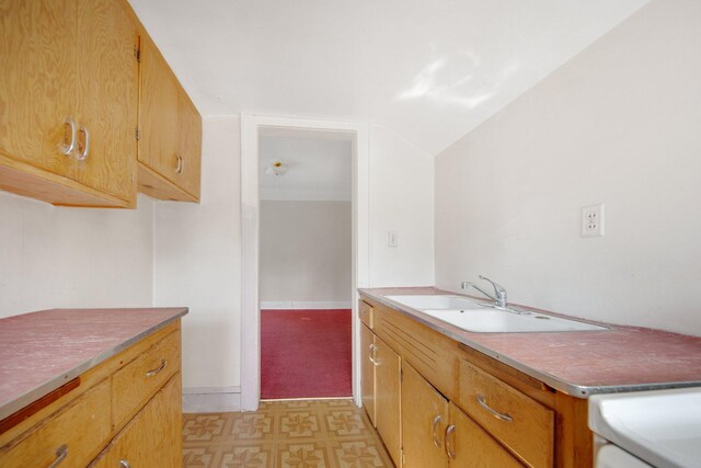 3736 Park Ave, Minneapolis, MN 55407 - kitchen featuring light flooring and vaulted ceiling