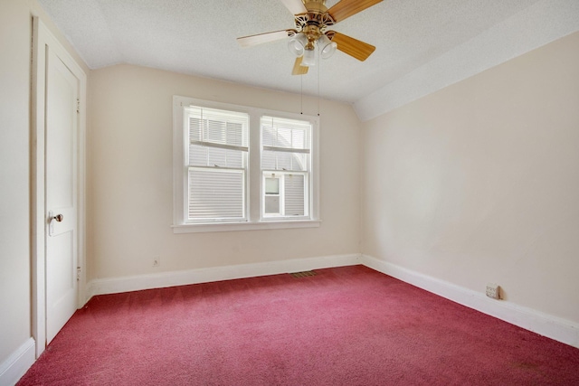 3736 Park Ave, Minneapolis, MN 55407 - unfurnished bedroom featuring dark colored carpet, lofted ceiling, a textured ceiling, and a ceiling fan