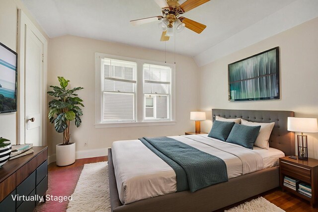 3736 Park Ave, Minneapolis, MN 55407 - bedroom featuring vaulted ceiling, dark wood-style floors, and a ceiling fan