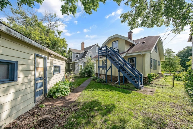 3736 Park Ave, Minneapolis, MN 55407 - rear view of property featuring stairs