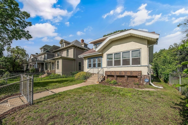3736 Park Ave, Minneapolis, MN 55407 - back of property with a gate and stucco siding