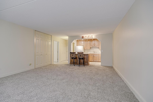 10521 Cedar Lake Rd Unit 208, Minnetonka, MN 55305 - living area with light carpet and baseboards
