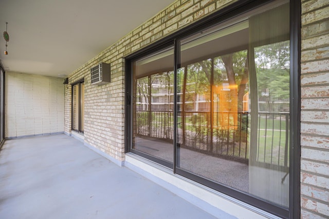10521 Cedar Lake Rd Unit 208, Minnetonka, MN 55305 - view of patio featuring a wall mounted air conditioner