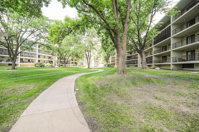 10521 Cedar Lake Rd Unit 208, Minnetonka, MN 55305 - view of community featuring a lawn