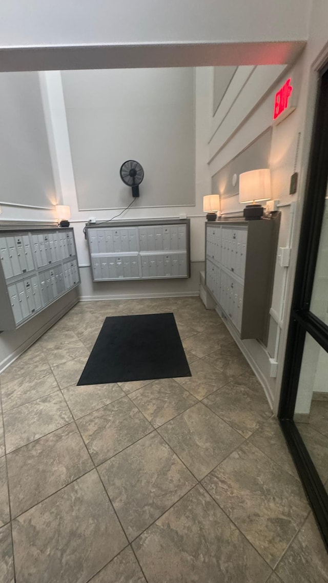 10521 Cedar Lake Rd Unit 208, Minnetonka, MN 55305 - bathroom featuring mail area and baseboards