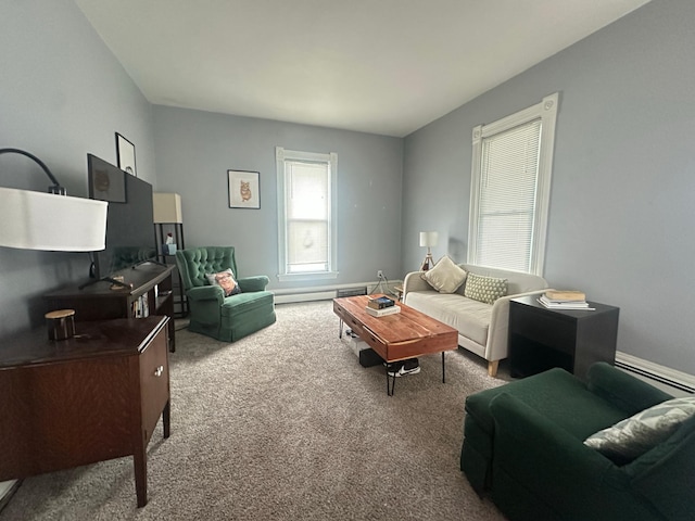 713 2nd St NE, Minneapolis, MN 55413 - living room with baseboard heating and carpet floors