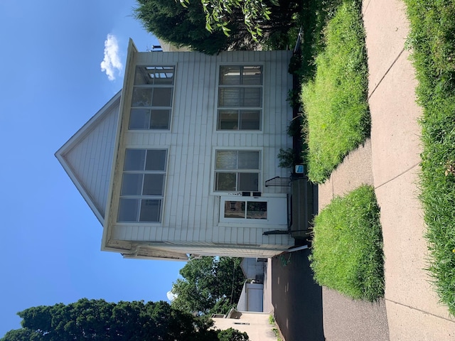 713 2nd St NE, Minneapolis, MN 55413 - view of front facade featuring board and batten siding