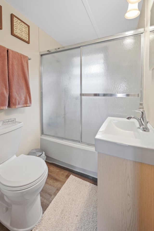 20963 Eagle Ct, Munson Twp, MN 56368 - bathroom featuring vanity, wood finished floors, and bath / shower combo with glass door