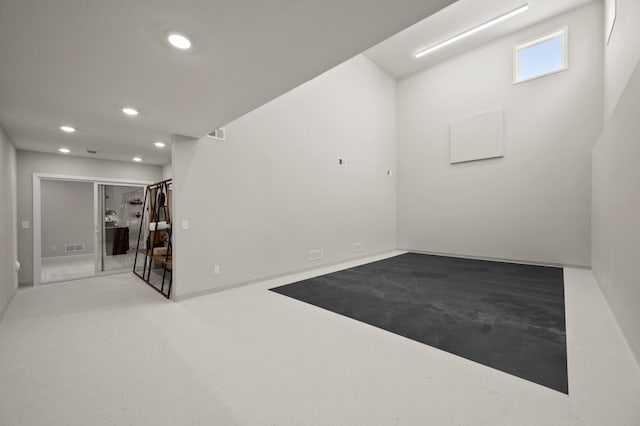 1162 Woods Creek Dr, Delano, MN 55328 - empty room featuring recessed lighting and finished concrete floors