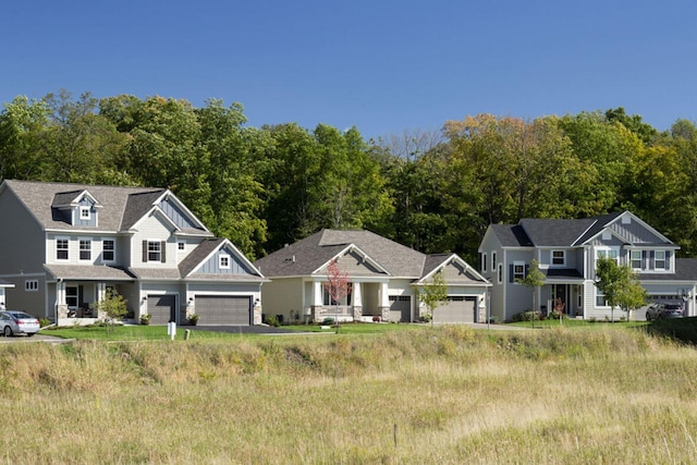 1162 Woods Creek Dr, Delano, MN 55328 - view of front of home featuring board and batten siding