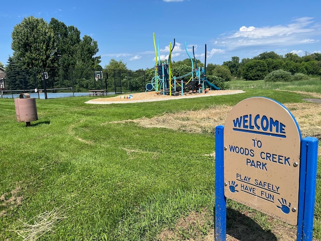 1162 Woods Creek Dr, Delano, MN 55328 - community jungle gym with a yard
