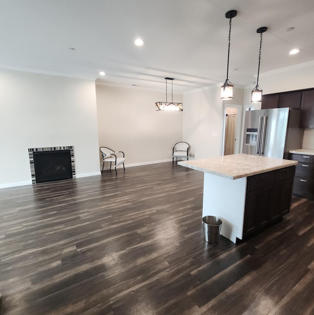 2238 Rolling Green Trl, North Mankato, MN 56003 - kitchen with stainless steel fridge with ice dispenser, a breakfast bar, recessed lighting, decorative light fixtures, and dark wood finished floors
